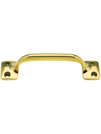 3 1/2 inch On Center Solid Brass Handle in Unlacquered Brass.